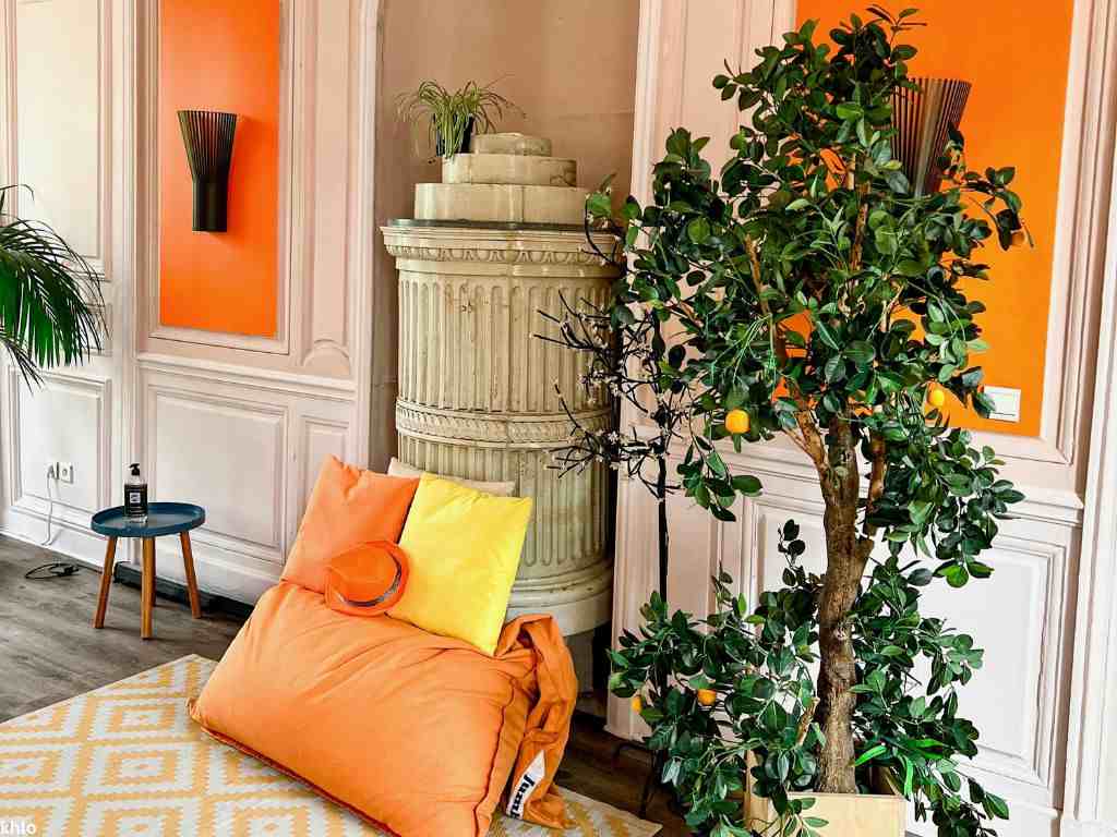 Elegant Interior with Orange Decorations and Houseplants